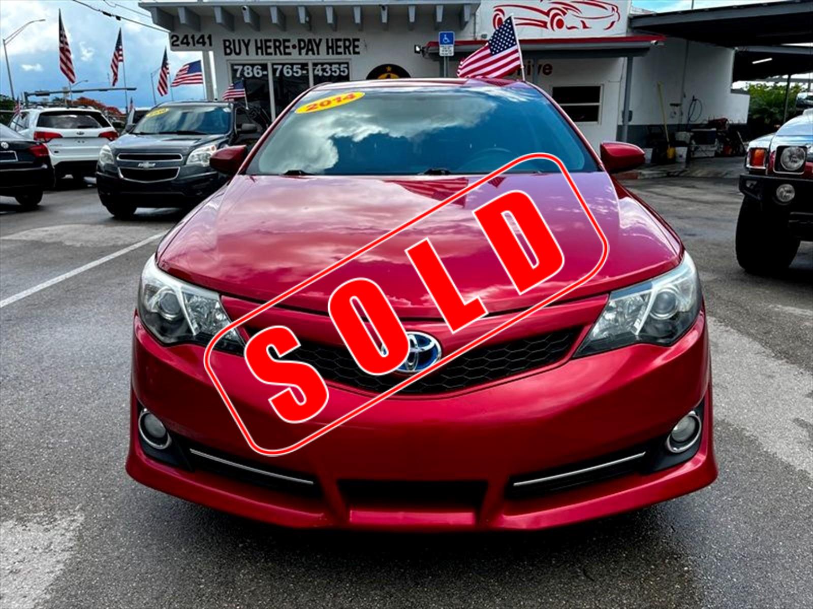 2014 Toyota Camry Hybrid in Princeton, FL