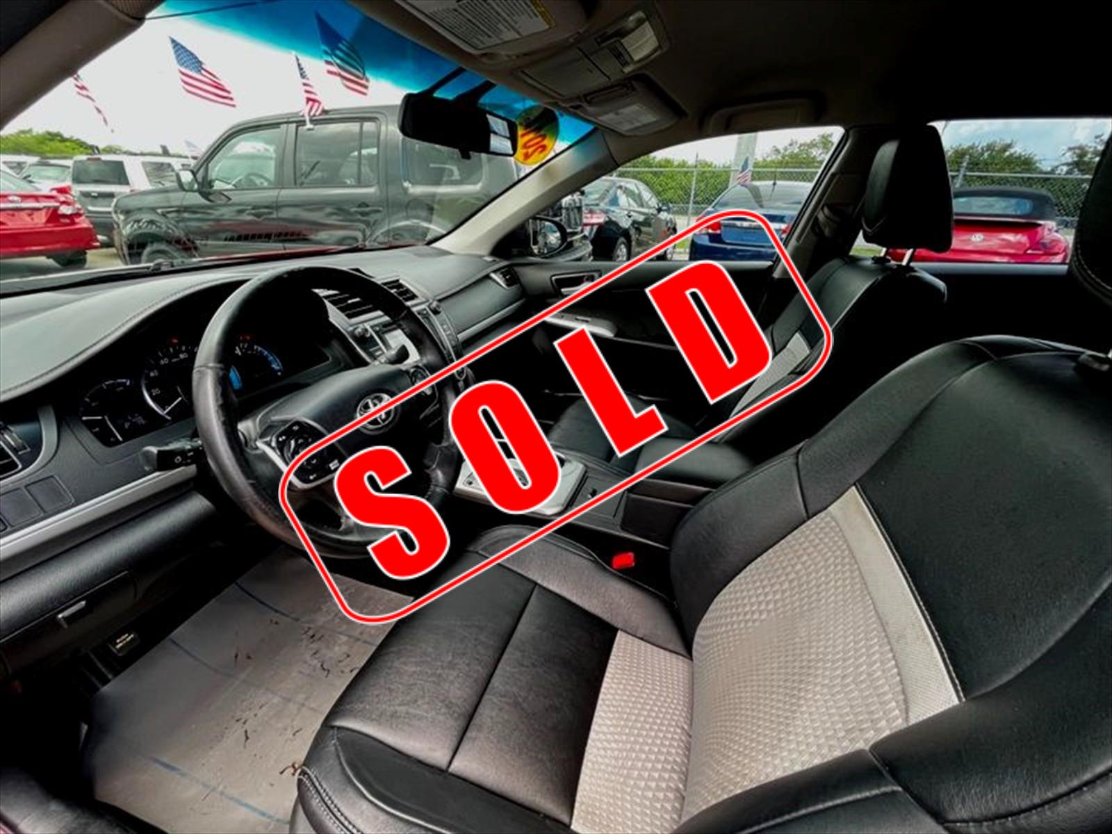 2014 Toyota Camry Hybrid in Princeton, FL