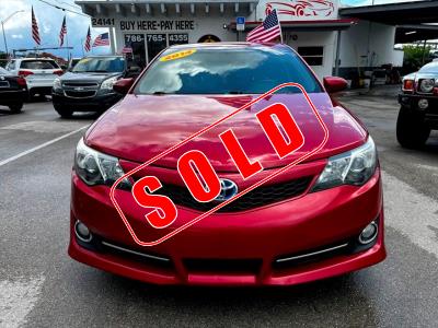 2014 Toyota Camry Hybrid in Princeton, FL